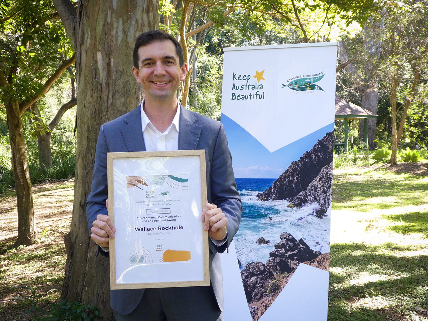 Hon Trevor Evans MP, Assistant Minister for Waste Reduction and Environmental Management with the 2021 Australian Sustainable Communities Tidy Towns Environmental Communication & Engagement Award presented to Wallace Rockhole, NT Hon Trevor Evans MP, Assistant Minister for Waste Reduction and Environmental Management with the 2021 Australian Sustainable Communities Tidy Towns Environmental Sustainability - Natural Environment Management Award presented to Rockhampton, Qld