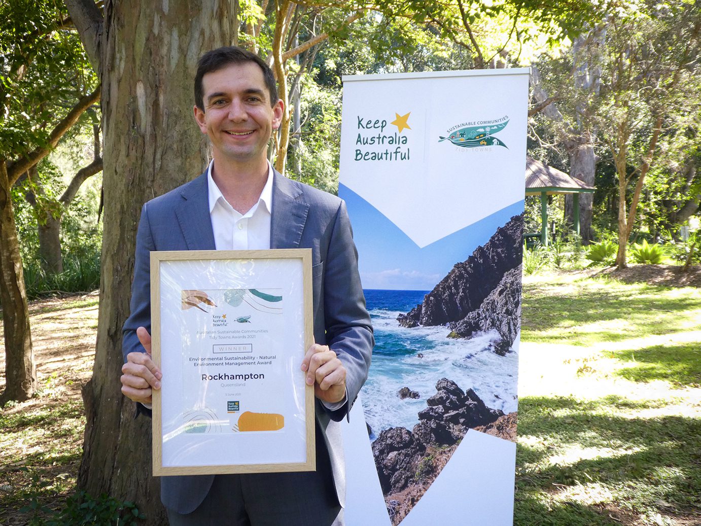 Hon Trevor Evans MP, Assistant Minister for Waste Reduction and Environmental Management with the 2021 Australian Sustainable Communities Tidy Towns Environmental Sustainability – Natural Environment Management Award presented to Rockhampton, Qld Environmental Sustainability – Water